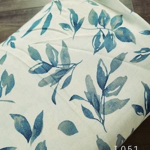 Linen blend fabric by the yard, light tan with blue leaves #L051
