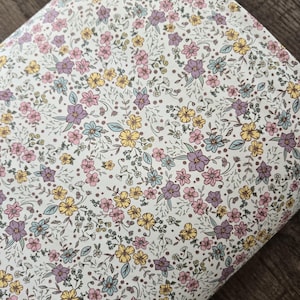 Livia floral, smooth poly spandex knit fabric by the yard, knit fabric, tiny floral on ivory #2095