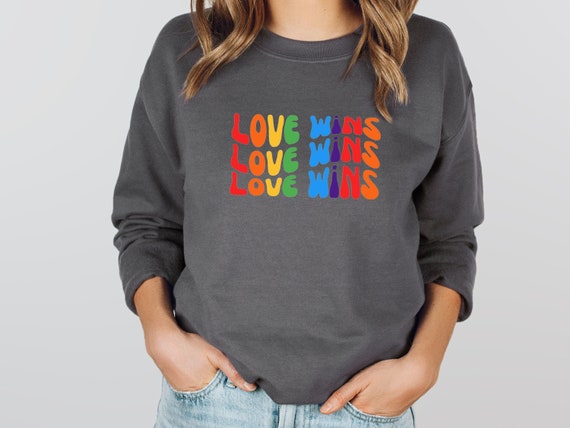 Love wins sweatshirt hotsell