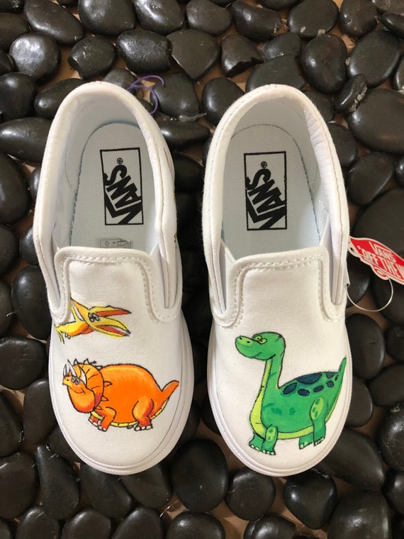 dinosaur slip on vans