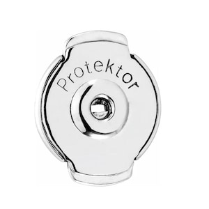 May include: A shiny, silver earring back with the word "Protektor" engraved on the surface. The earring back has a rounded shape with a central hole and a curved edge.