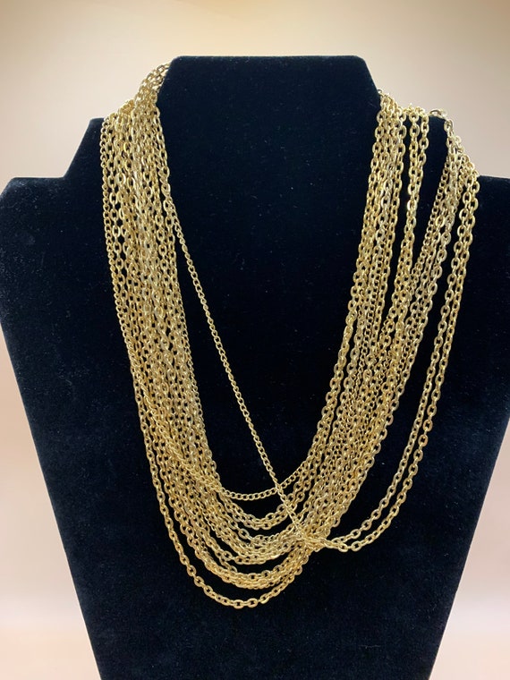 Crown Trifari  multi strand gold tone necklace