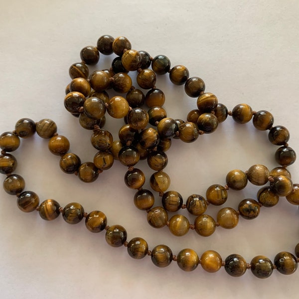 Vintage tiger eye beaded necklace knotted in between beads