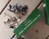 Singer class 301 sewing machine metal feet parts ruffler etc and booklet manual