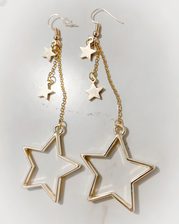 gold dangle star earrings