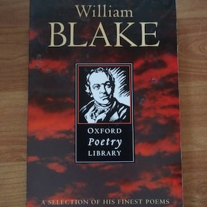 May include: A book cover featuring the name "William Blake" in gold lettering. The cover has a dark red and black background with a portrait of a man in a black and white frame. The text "Oxford Poetry Library" is also visible.