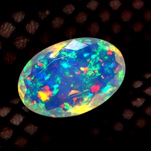 Ethiopian Opal Gemstone: 9.50 Carat Faceted Oval, Multi-Color Fire