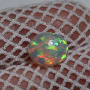 Ethiopian Opal Cabochon: 1.70 Carat Oval Rainbow Fire Gemstone