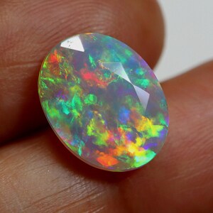 3.90 Carat Ethiopian Opal Gemstone: Multi-Color Fire Oval Cut Faceted Opal