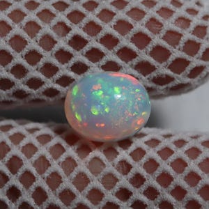 Ethiopian Welo Opal Cabochon: 3.80 Carat Oval Rainbow Gemstone