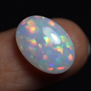 Ethiopian Opal Cabochon: AAA+ Quality Oval Gemstone (3.55 Carats, 10x14x5 MM)