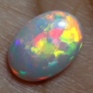 AAA Ethiopian Opal Cabochon: 2.90 Carat Oval Gemstone