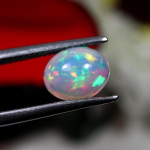 10x8mm Oval Top Grade 2.2Ct. Rainbow Fire Natural Ethiopian Opal Cabochon For Ring