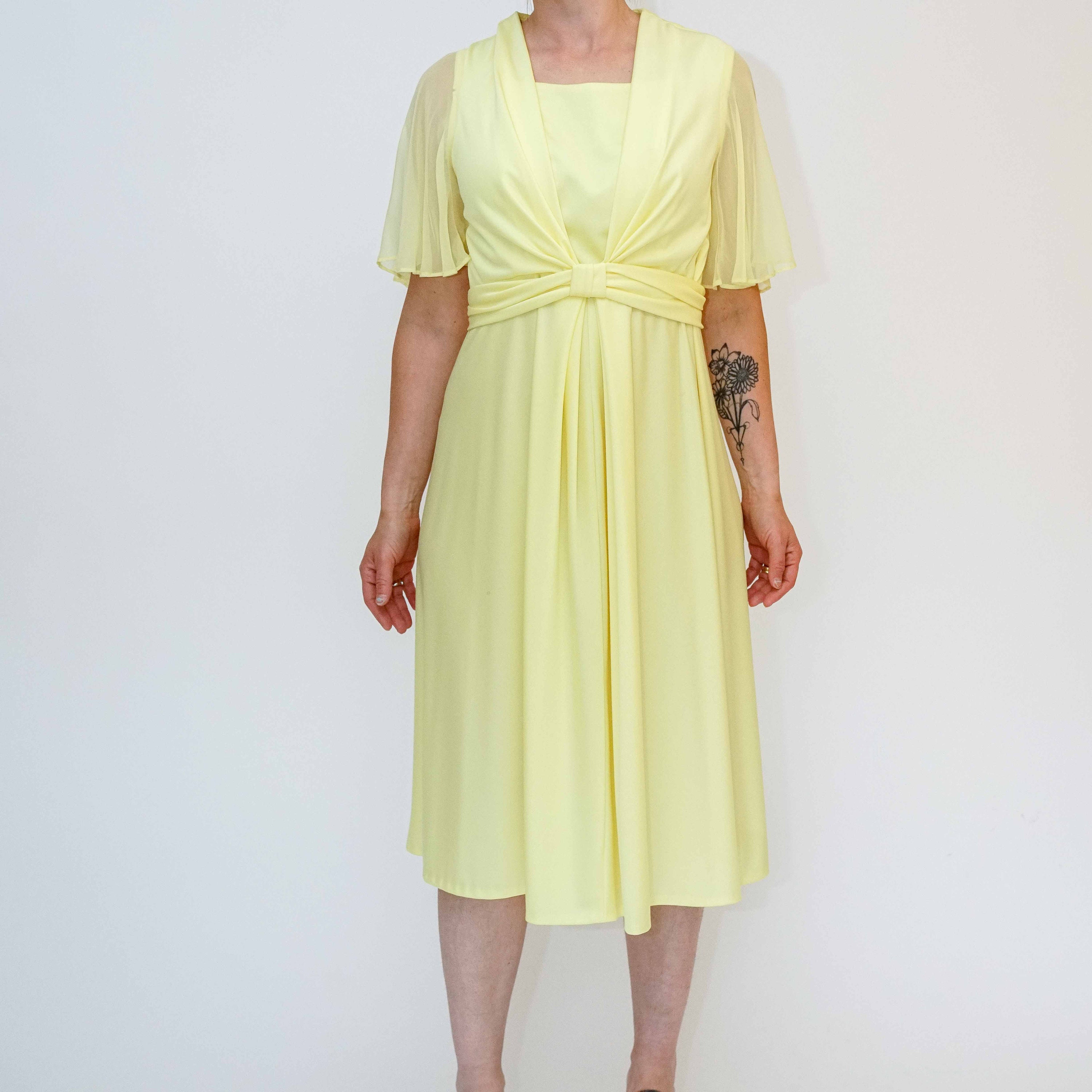 yellow fit and flare dress with sleeves
