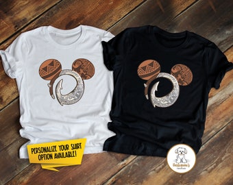 May include: Two t-shirts with a Mickey Mouse silhouette design featuring a brown and white fish hook and tribal patterns. The text "PERSONALIZE YOUR SHIRT OPTION AVAILABLE!" is on the white t-shirt.