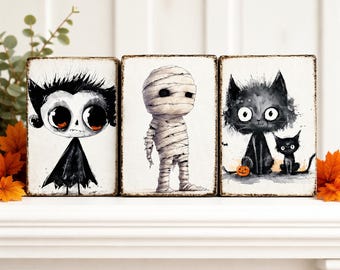 Monstruos de bloques de madera de Halloween: momia, payaso, hombre lobo, vampiro y más. Arte de personajes espeluznantes.