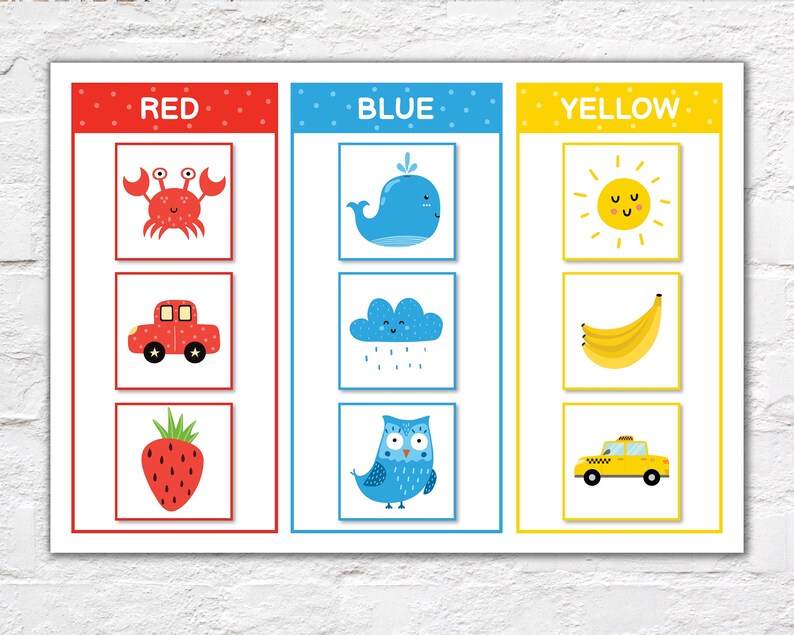 May include: A colorful educational poster with the words "RED", "BLUE", and "YELLOW". Each color section features three illustrations: a crab, car, and strawberry for red; a whale, cloud, and owl for blue; and a sun, banana, and taxi for yellow.