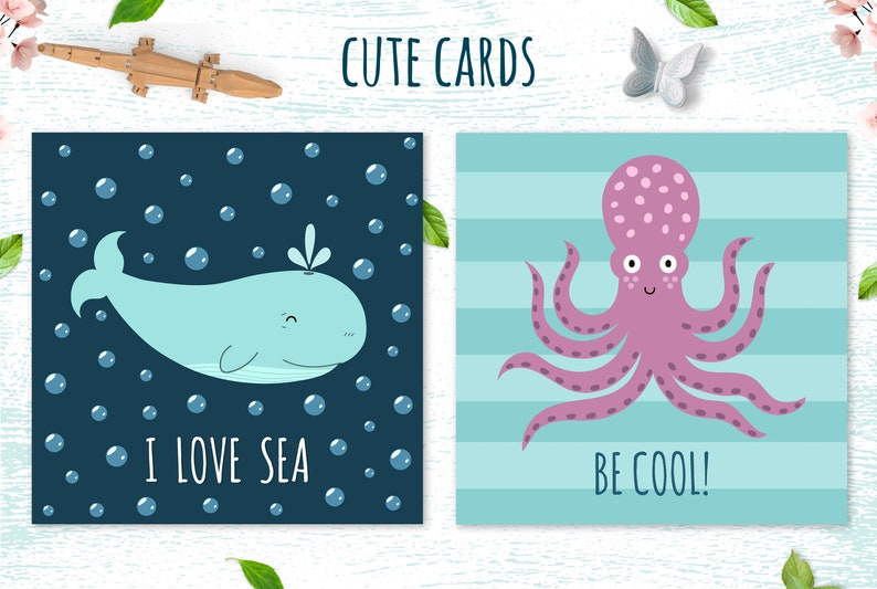 May include: Two illustrated greeting cards with ocean themes. The first card features a blue whale with bubbles and the text "I love sea". The second card features a pink octopus with the text "Be cool!"