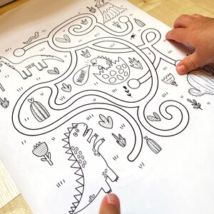 May include: A black and white printable maze activity featuring a dinosaur theme. The maze includes a dinosaur, a cactus, and the word "Mommy!"