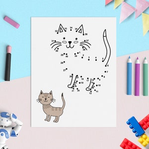 May include: A black and white connect-the-dots activity sheet featuring a cat. The numbers 1 through 40 are scattered around the outline of the cat. A completed image of a brown cat is shown below the connect-the-dots activity.