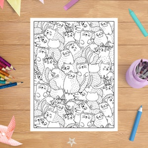 Op de afbeelding: Een zwart-witte kleurplaat met een grote groep katten in verschillende poses. De katten zijn allemaal getekend in een eenvoudige, cartoonachtige stijl.