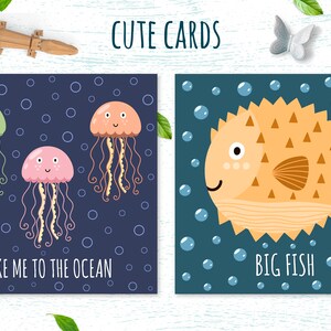 May include: Two illustrated cards with a nautical theme. The first card features three jellyfish in shades of green, pink, and orange against a dark blue background with white bubbles. The text on the card reads "Take me to the ocean". The second card features a yellow pufferfish with brown spots and a brown tail fin against a dark blue background with white bubbles. The text on the card reads "Big Fish".