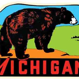 May include: A vintage travel sticker featuring a black bear standing on a rock with a green, blue, and orange background. The text "MICHIGAN" is printed in red letters at the bottom of the sticker.