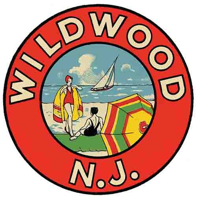 May include: A red circle with the words "WILDWOOD N.J." in white. Inside the circle is a beach scene with two people in bathing suits, an umbrella, and a sailboat.