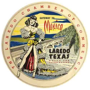 May include: A vintage round sticker with a white background and a red, white and blue border. The sticker features a woman in a yellow dress and a white fur coat standing on a bridge. The text on the sticker reads "The Laredo Chamber of Commerce, Gateway to Mexico, Laredo Texas".