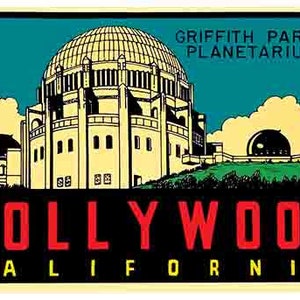 May include: A vintage travel poster featuring the Griffith Park Planetarium in Hollywood, California. The poster has a blue background with a yellow and white building in the center. The text "Griffith Park Planetarium" is in black letters at the top of the poster, and the text "HOLLYWOOD CALIFORNIA" is in red letters at the bottom.