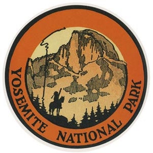 May include: A vintage-style orange and white circular sticker with the text "Yosemite National Park" surrounding a depiction of Half Dome, a mountain in Yosemite National Park, California.
