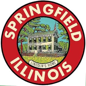 Puede incluir: Un letrero circular rojo y blanco con el texto "Springfield, Illinois, Lincoln's Home" en un círculo blanco con un dibujo de una casa y árboles.