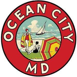 May include: A red circle with the text "OCEAN CITY MD" in white. Inside the circle is a beach scene with two people in swimsuits, an umbrella, and a sailboat.