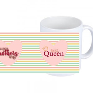 May include: White ceramic mug with a colorful striped design. The mug features two pink hearts with text. One heart says "Happy Mothers Day" and the other says "My Queen" with a crown.
