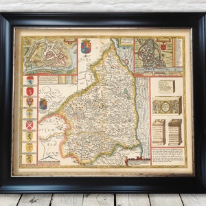 May include: An antique map of the county of Northumberland, England, printed in the 17th century. The map is framed in a black frame and features a detailed depiction of the county's geography, including rivers, towns, and villages. The map also includes a key with symbols representing different features, such as churches, castles, and forests.