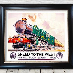 May include: Framed vintage poster featuring a green and red steam train with the text "SPEED TO THE WEST." The poster includes the GWR logo and the names of several regions. The train is set against a cloudy sky.