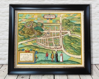 May include: An antique map of Edinburgh, Scotland, with the text "EDENVBRG SCOTIAE METROPOLIS" in the lower left corner. The map is hand-colored and shows the city's layout with surrounding hills and rivers.