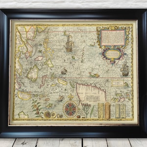 May include: An antique map of the world, printed on paper with a cream background. The map shows the continents of Asia, Africa, and Australia. The map is framed in a black frame with a gold trim. The map is titled "Nova Guinea, et Insulae adjacentes, ex observationibus et relationibus, ab anno 1595 ad annum 1603, collecta et delineata, per Gerardum Mercatorem, Cosmographum Regis Hispaniarum."