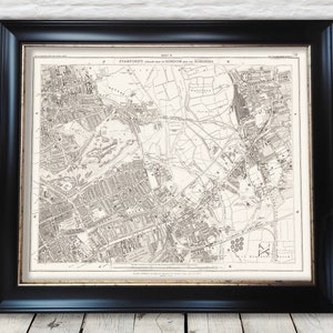 May include: A vintage black and white map of London and its suburbs, titled "Stanford's London Map and Suburbs" with the text "Edition 1, 1891" in the upper right corner.