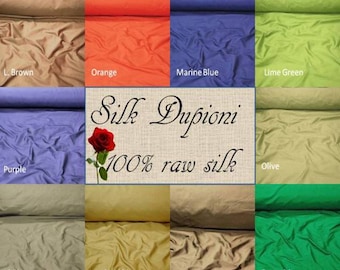 May include: A collection of 12 fabric swatches in various colors, including brown, orange, blue, green, purple, olive, khaki, gold, beige, and emerald. The fabric is silk dupioni, 100% raw silk.