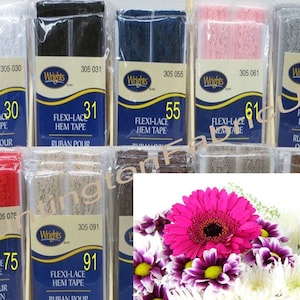 May include: Assortment of white, black, blue, pink, gray, red, and beige lace trim with the text "Flexi-Lace Hem Tape" and corresponding numbers 30, 31, 55, 61, 70, 75, and 91.