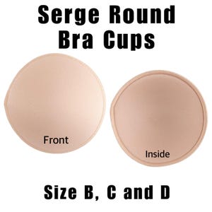 May include: Two beige Serge Round Bra Cups, one labeled "Front" and the other "Inside." The cups are round with a stitched edge. The text "Size B, C and D" is displayed below the cups.
