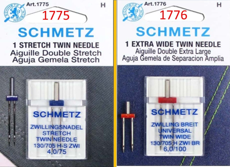 May include: Two packages of Schmetz sewing machine needles. One package is labeled "1 Stretch Twin Needle" and the other is labeled "1 Extra Wide Twin Needle". Each package contains needles with blue or red tops, and the text "Schmetz" is visible.