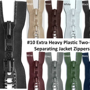 May include: A selection of #10 extra heavy plastic two-way separating jacket zippers in various colors, including beige, brown, white, black, wine, grey, green, and navy.