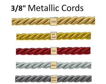 May include: Five spools of 3/8 inch metallic cords in different colours: gold, antique gold, red, silver, and black silver.