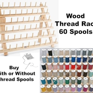 May include: Wooden thread rack with 60 spools, holding a variety of colored thread spools. The rack is made of natural wood and has five shelves. The rack is available with or without thread spools.