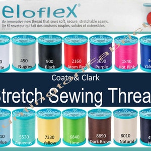 May include: A display of ten spools of Coats & Clark eloflex stretch sewing thread. The spools are arranged in two rows of five. The thread colors are white, silver, black, red, purple, pink, blue, light blue, turquoise, yellow, green, brown, beige, and navy.