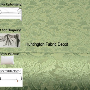 May include: A green fabric with a floral damask pattern. The fabric is best for upholstery, drapery, pillows, and tablecloths. The text "Huntington Fabric Depot" is visible in the image.