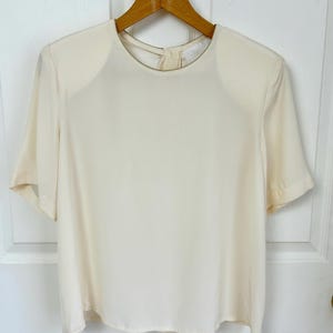 Vintage Women&#39;s Silk Cream Short Sleeve Blouse with Gold Crewneck Collar Size Medium | 90&#39;s Work Wear Style
