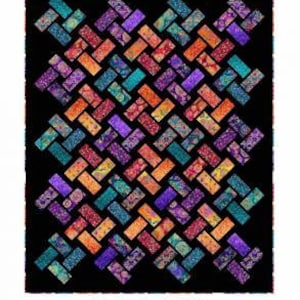 May include: A quilt pattern called "Eclectica Set Spinning" featuring a colourful geometric design with a black background. The pattern is made up of many small squares and rectangles in shades of orange, red, purple, blue, and green. The quilt pattern is from Pine Tree Country Quilts.